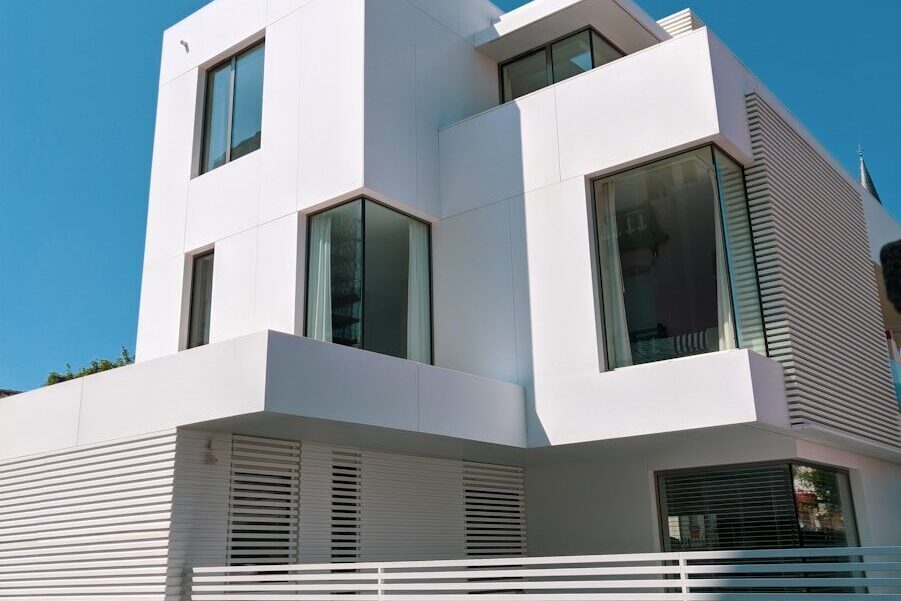 white concrete building under blue sky during daytime